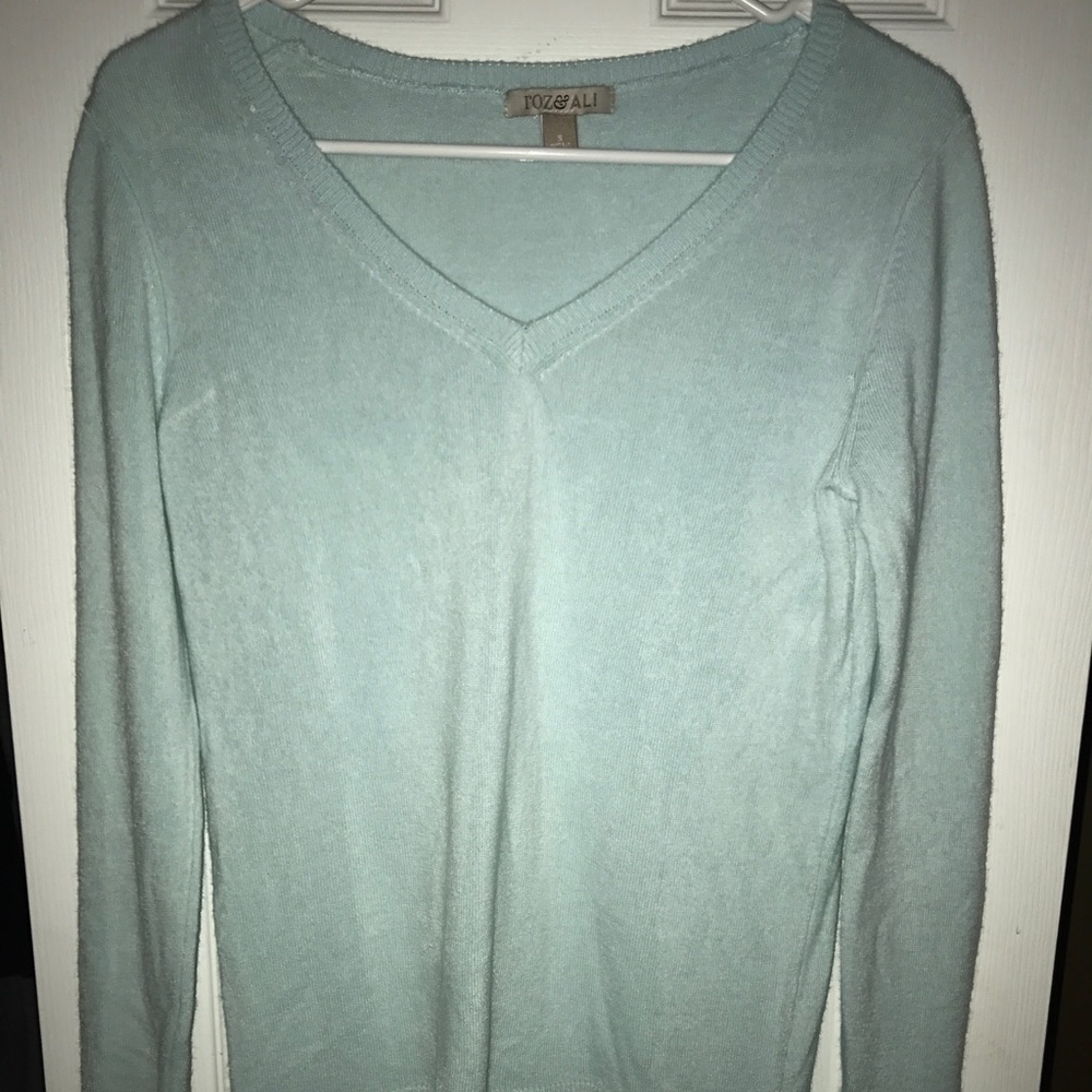 Light blue sweater